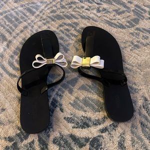 Black Melissa flip flops
